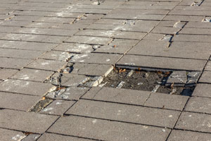 A damaged sidewalk may cause personal injury.